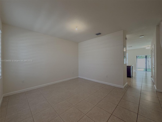 view of tiled spare room