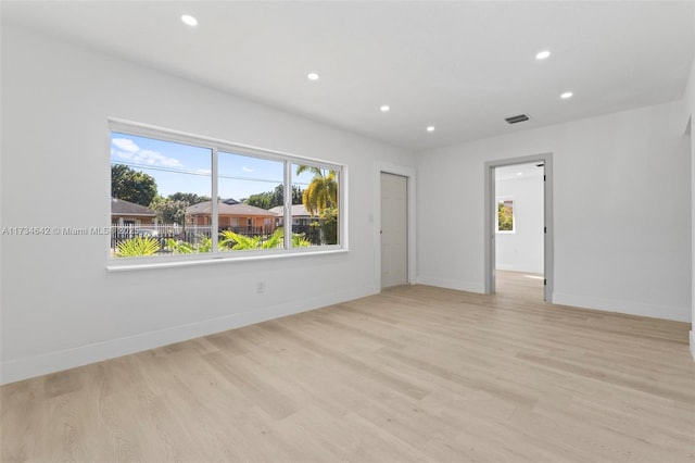 empty room featuring light hardwood / wood-style floors