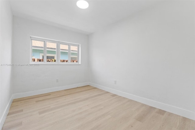 unfurnished room featuring light wood-type flooring