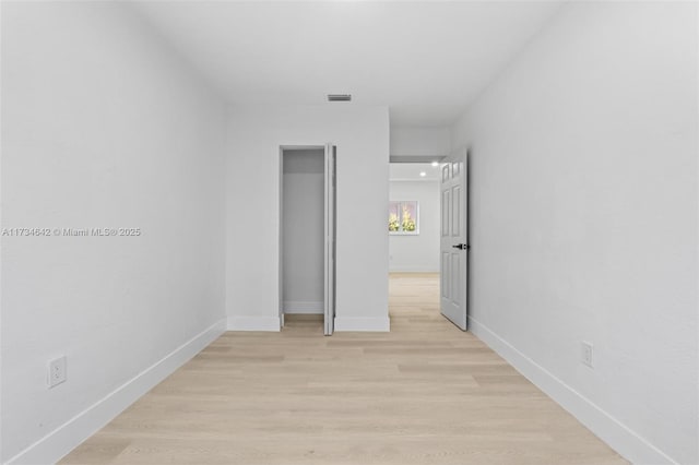 unfurnished bedroom with light hardwood / wood-style floors