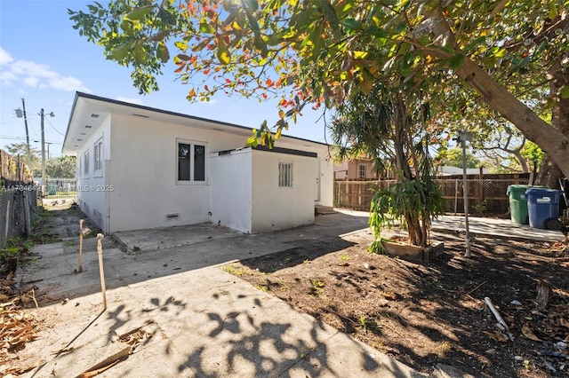 back of house featuring a patio area