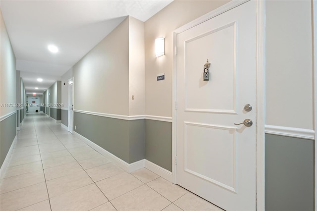 hallway featuring light tile patterned flooring