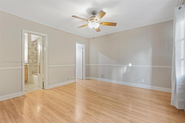 unfurnished bedroom featuring crown molding, light hardwood / wood-style floors, ceiling fan, and ensuite bathroom