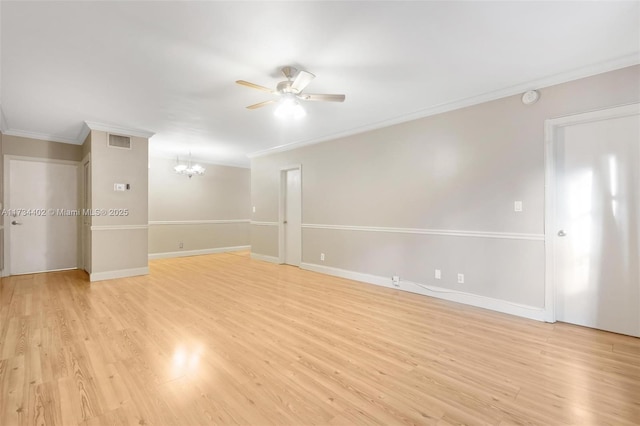 empty room featuring crown molding, light hardwood / wood-style flooring, and ceiling fan with notable chandelier