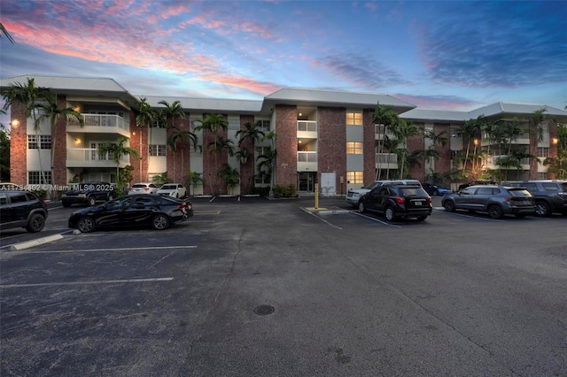 view of outdoor building at dusk