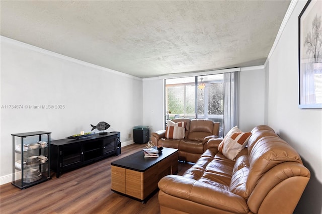 2851 Somerset Dr Unit 415, Lauderdale Lakes, FL 33311 - living room featuring wood finished floors, ornamental molding, a textured ceiling, and baseboards