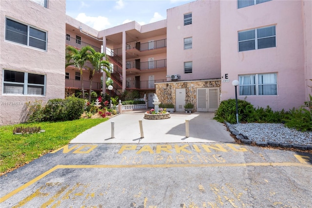 2851 Somerset Dr Unit 415, Lauderdale Lakes, FL 33311 - view of apartment building / complex with uncovered parking