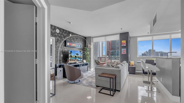 living room with light tile patterned floors