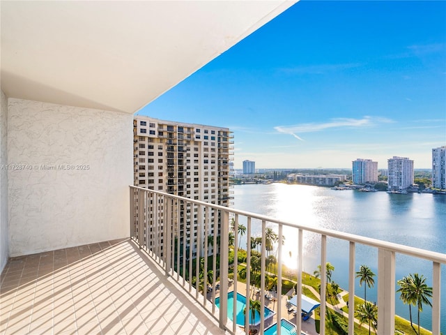 balcony featuring a water view