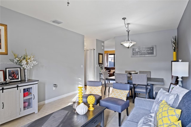 living room with light tile patterned floors