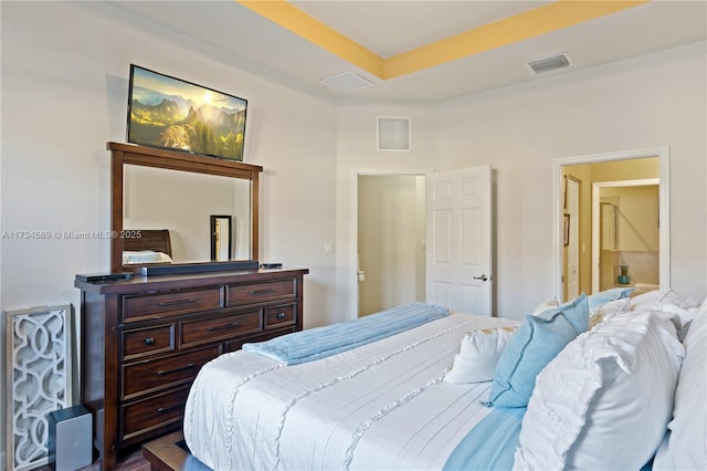 bedroom featuring a tray ceiling