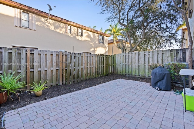 view of patio with a grill