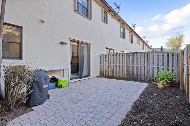 rear view of property with a patio area