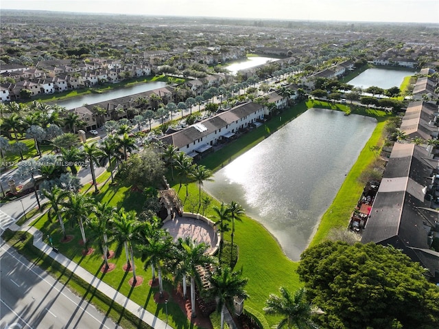 bird's eye view with a water view