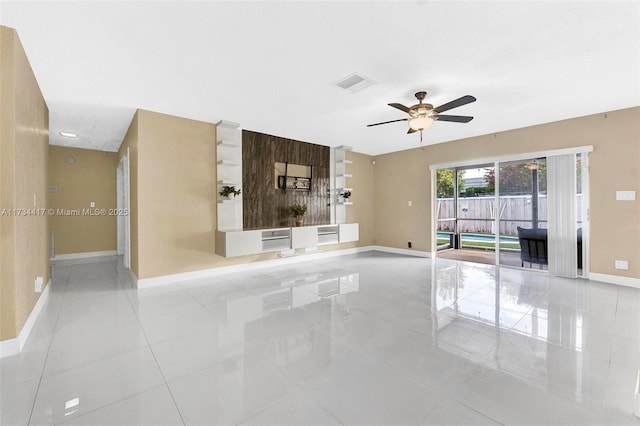 unfurnished living room with light tile patterned floors and ceiling fan