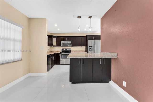 kitchen featuring a kitchen bar, decorative light fixtures, light tile patterned floors, kitchen peninsula, and stainless steel appliances