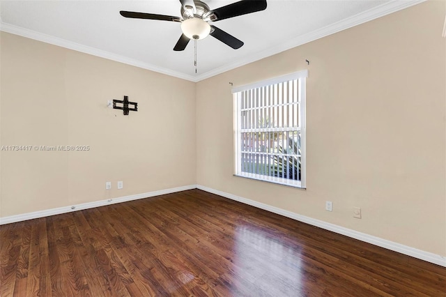 empty room with ornamental molding, hardwood / wood-style floors, and ceiling fan