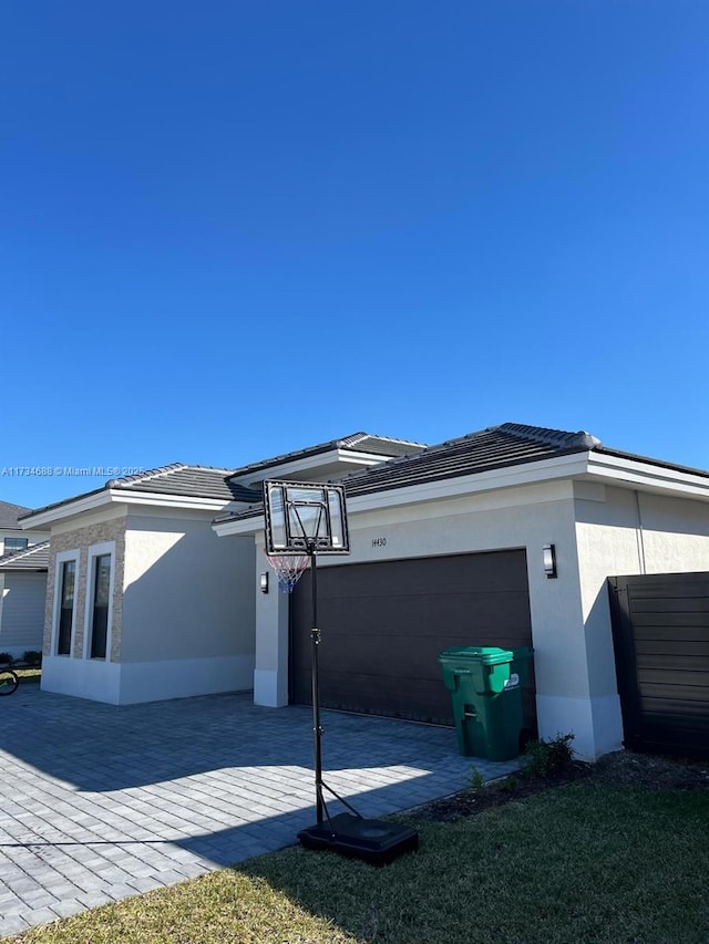 view of home's exterior with a garage