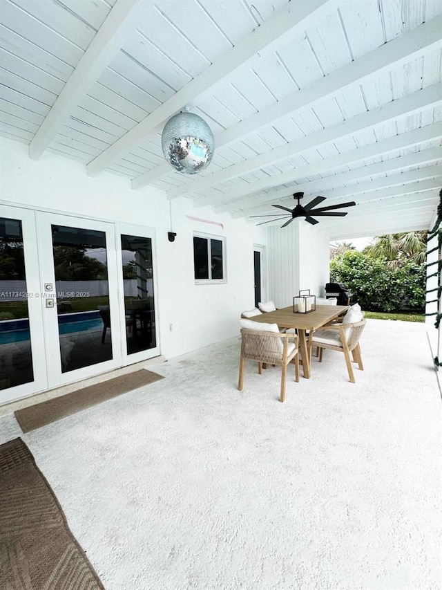 view of patio featuring french doors and ceiling fan