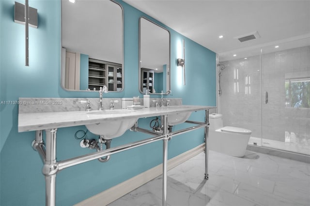 bathroom featuring visible vents, toilet, marble finish floor, a sink, and a shower stall