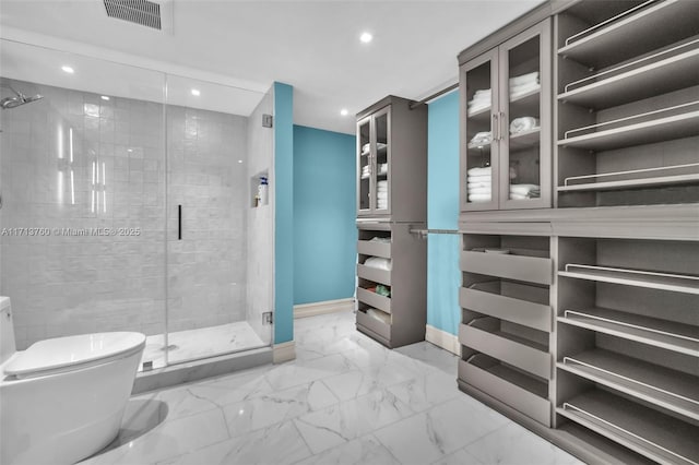 full bathroom with visible vents, toilet, marble finish floor, and a shower stall