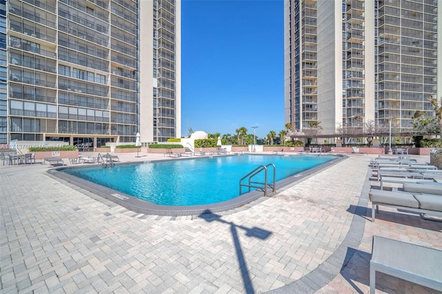 pool with a patio area