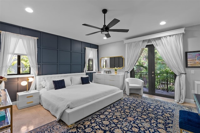 tiled bedroom featuring access to exterior and ceiling fan