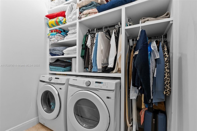 laundry area with washer and clothes dryer