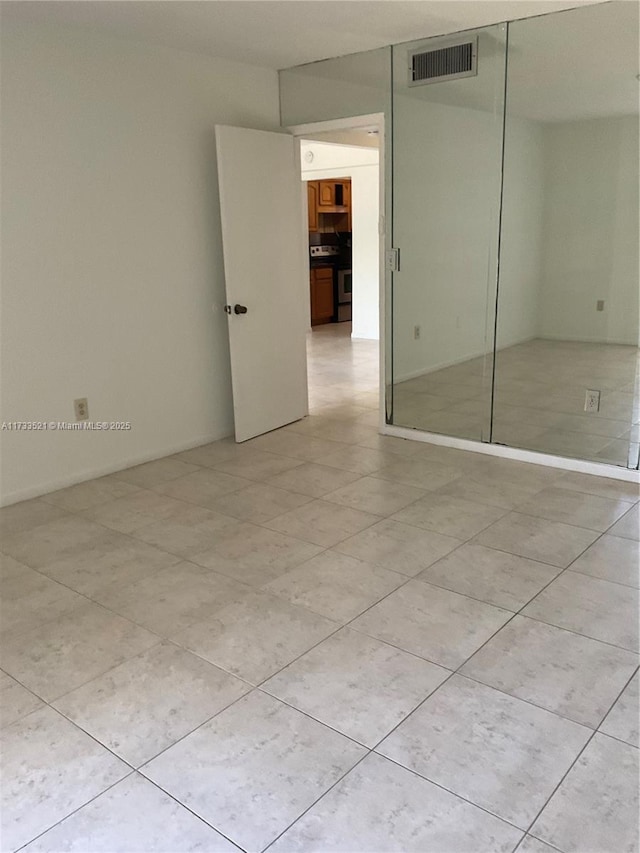 unfurnished bedroom with a closet