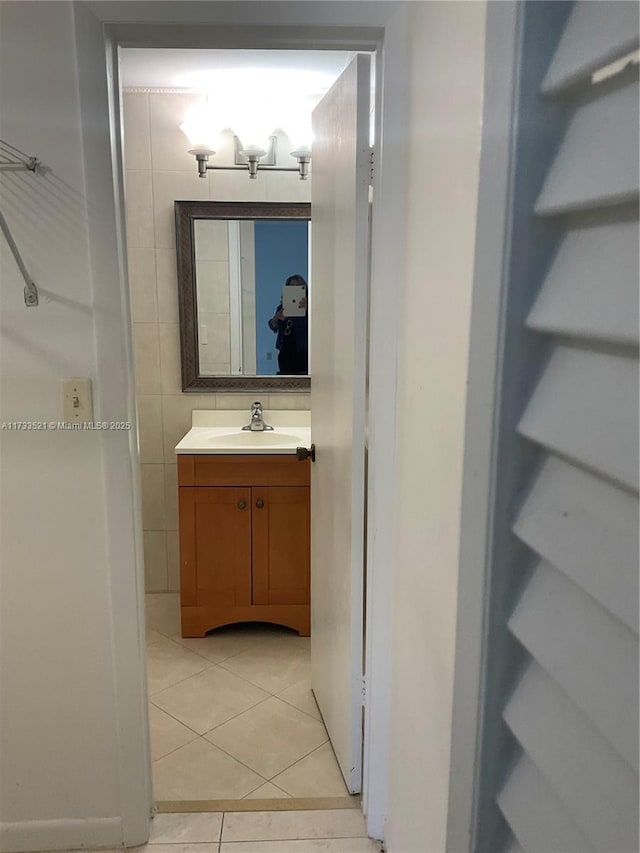 201 178th Dr Unit 309, Sunny Isles Beach, FL 33160 - bathroom with a chandelier, tile patterned floors, and vanity