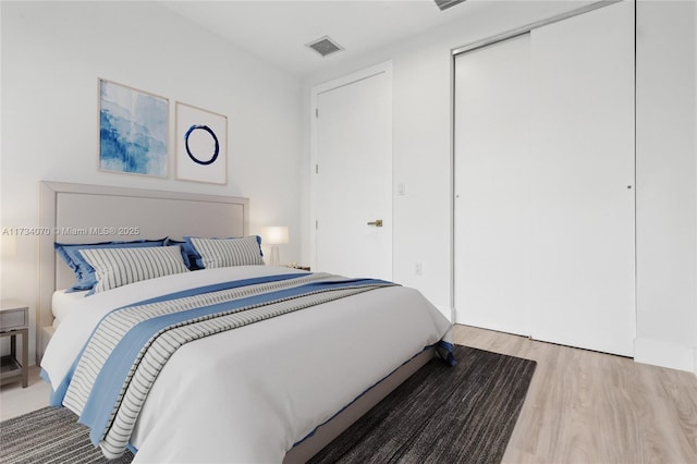 bedroom with wood-type flooring