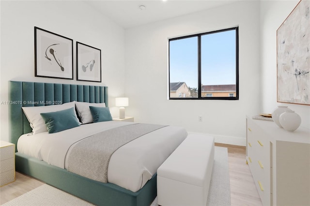 bedroom featuring light hardwood / wood-style flooring