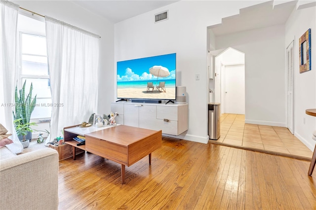 living room featuring light wood-type flooring