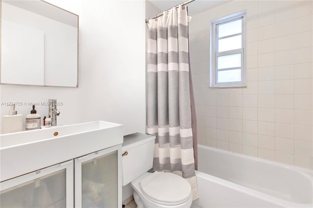 full bathroom with vanity, toilet, and shower / bath combo