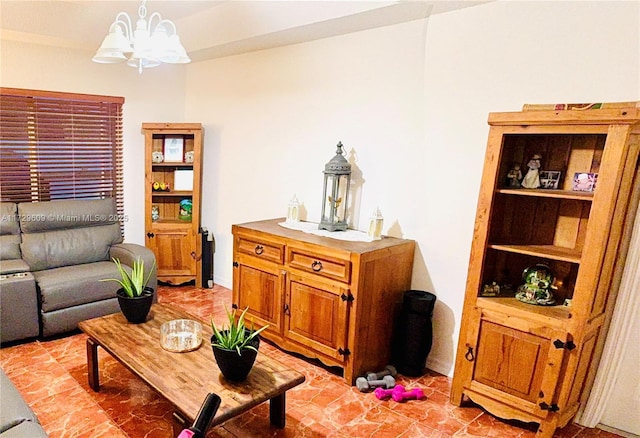 living room with a chandelier