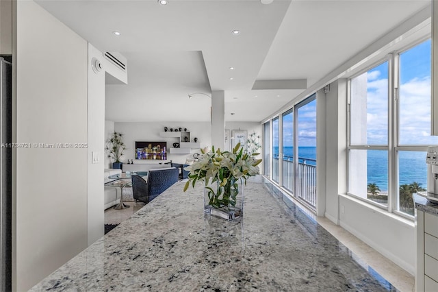 dining room featuring a water view