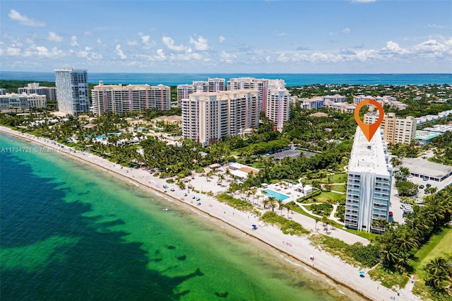 bird's eye view with a view of the beach and a water view