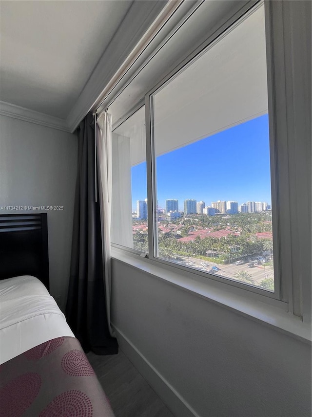 bedroom featuring crown molding