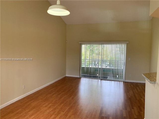 unfurnished room featuring wood-type flooring