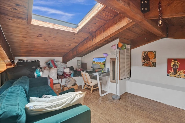 interior space with hardwood / wood-style flooring, vaulted ceiling with skylight, and wooden ceiling