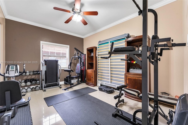 exercise area with crown molding, light tile patterned flooring, and ceiling fan