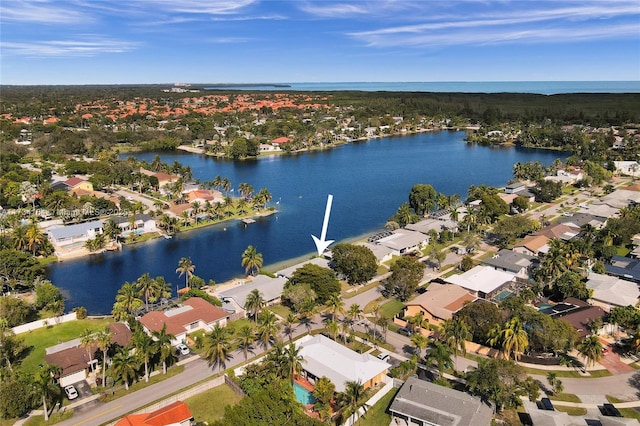 drone / aerial view with a water view