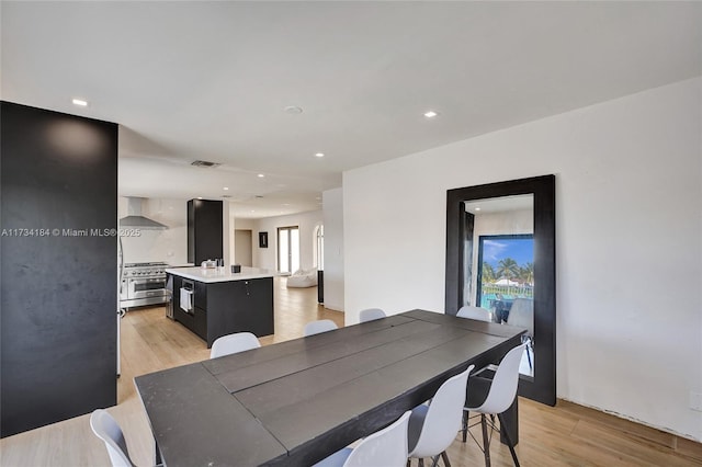 dining area featuring light hardwood / wood-style flooring