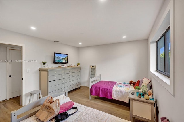 bedroom featuring light wood-type flooring