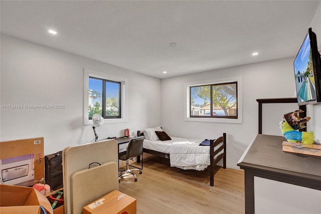 bedroom with light hardwood / wood-style flooring