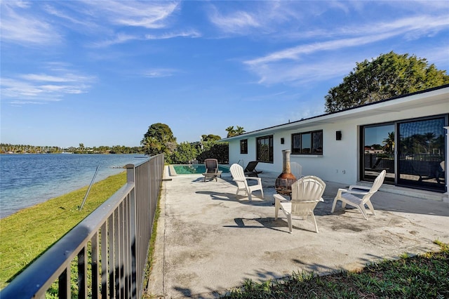 view of patio / terrace featuring a water view