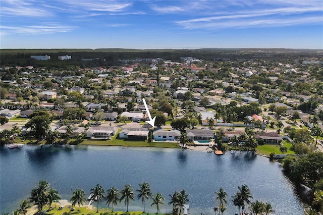 birds eye view of property featuring a water view