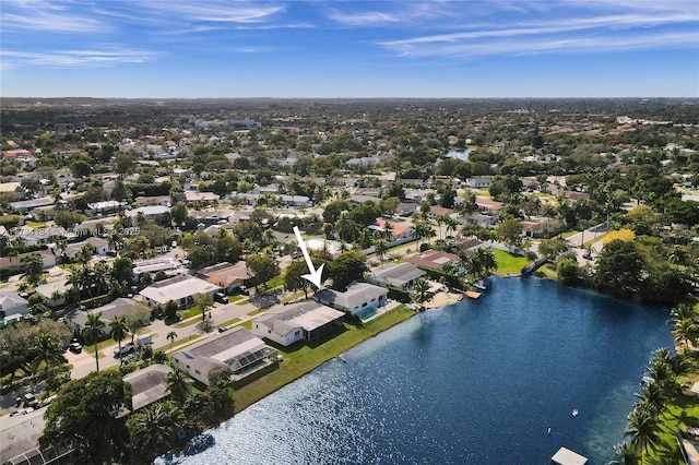 drone / aerial view with a water view