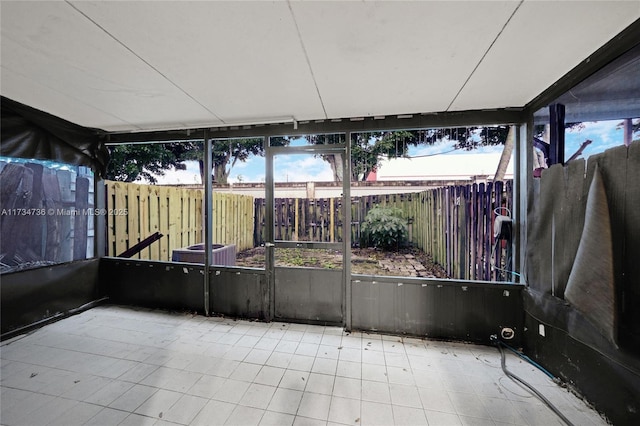 view of unfurnished sunroom