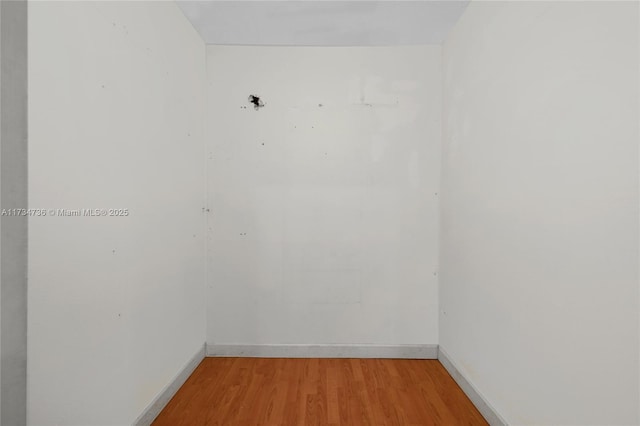 empty room featuring hardwood / wood-style floors